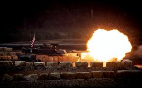 U.S. soldiers fire their M1A2 Abrams tank in a defensive lane during the U.S. Army Europe and Africa International Tank Challenge at Grafenwoehr Training Area on Feb. 13, 2025. Gen. Christopher Donahue, head of U.S. Army Europe and Africa, says the service's command-and-control system in Europe offers a model that should be followed in other places. 
