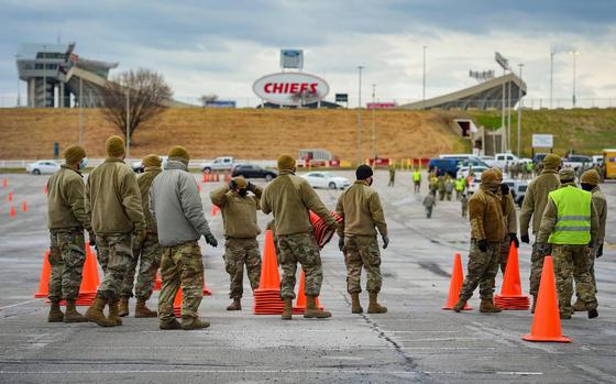 Missouri National Guard members were on site Thursday at Arrowhead Stadium to set up a COVID-19 mass vaccination center. Event organizers hope to vaccinate about 4,000 people each day during the two-day event that will take place on Friday and Saturday. Appointments are required for a vaccination.