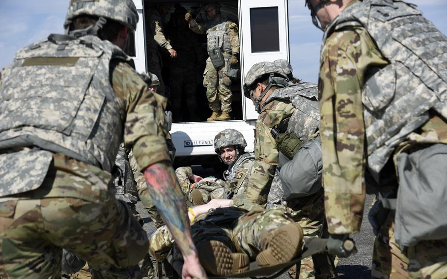 Air Force medics practice treating mass casulaties from an enemy drone strike at Yokota Air Base, Japan, Oct. 20, 2023.