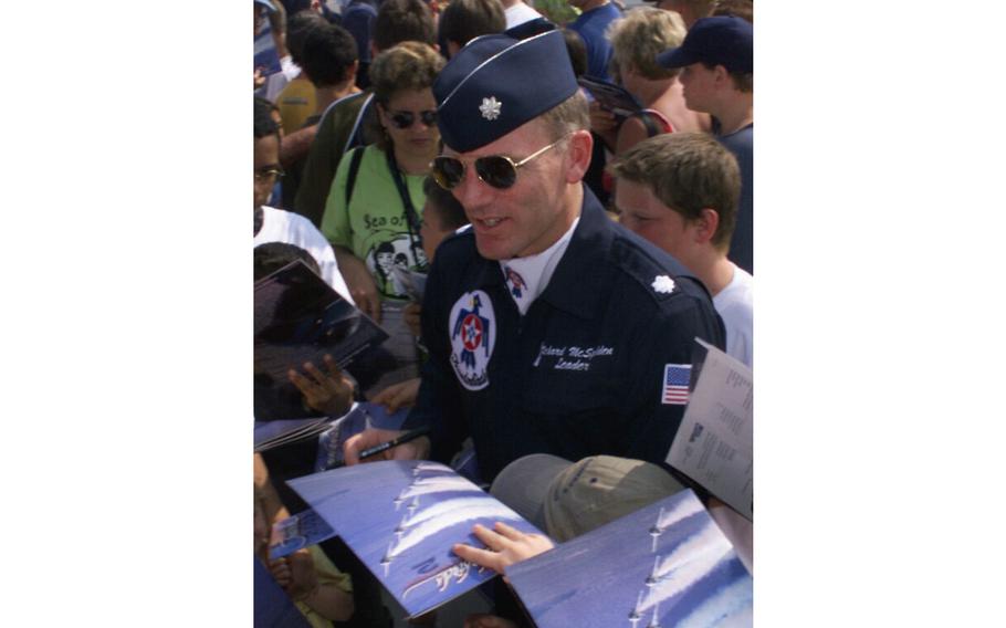 U.S. Air Force Lt. Col. Richard G. McSpadden (center), commander/leader of the USAF Thunderbirds aerial demonstration team signs autographs for spectators and fans during an annual open house at Eglin Air Force Base, Fla., in 2002. McSpadden and former NFL player Russ Francis were killed in a plane crash outside of Lake Placid, N.Y., Sunday, Oct. 1, 2023.