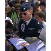 US Air Force (USAF) Lieutenant Colonel (LTC) Richard G. McSpadden (center), Commander/Leader of the USAF Thunderbirds aerial demonstration team signs autographs for spectators and fans during the annual Open House held at Eglin Air Force Base (AFB) Florida (FL). 