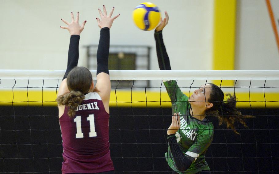 Kubasaki senior Sophia Grubbs, right, will play volleyball in the fall for Whatcom Community College in Bellingham, Wash., of the Northwest Athletic Conference on partial scholarship.