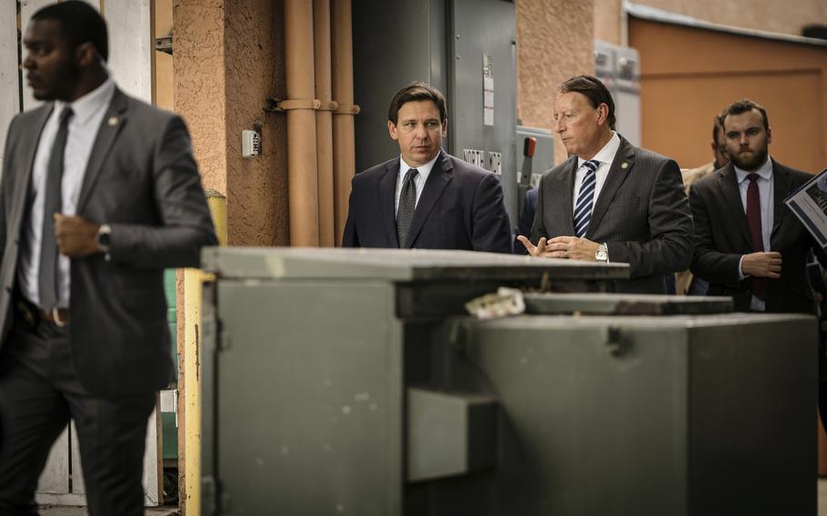 Florida Gov. Ron DeSantis leaves after holding a news conference at Anna Maria Oyster Bar Landside in Bradenton, Fla., on Sept. 20, 2022.