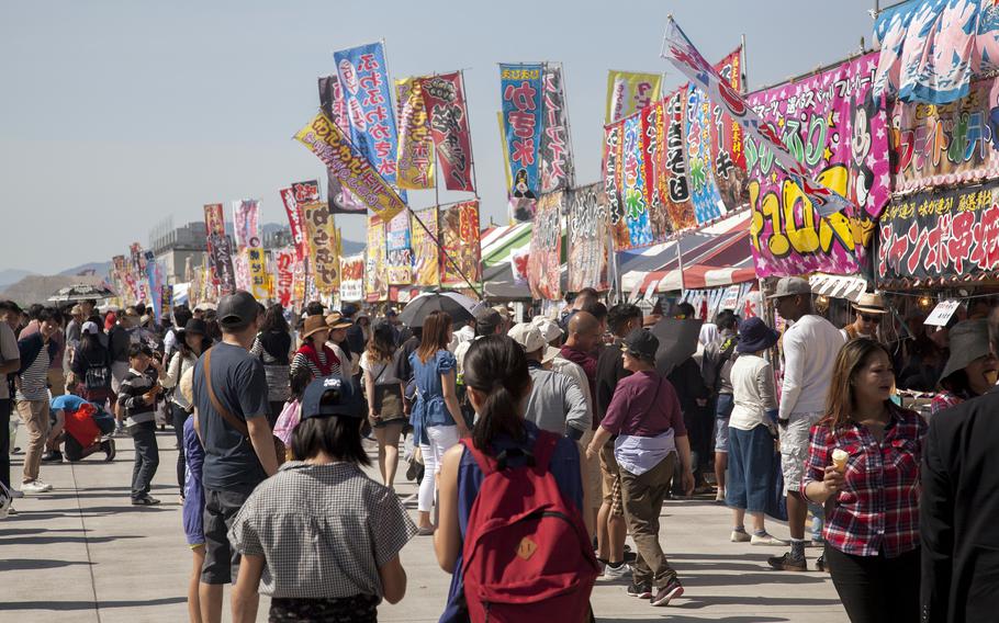 People attend the Friendship Day festival at Marine Corps Air Station Iwakuni, Japan, May 5, 2016.