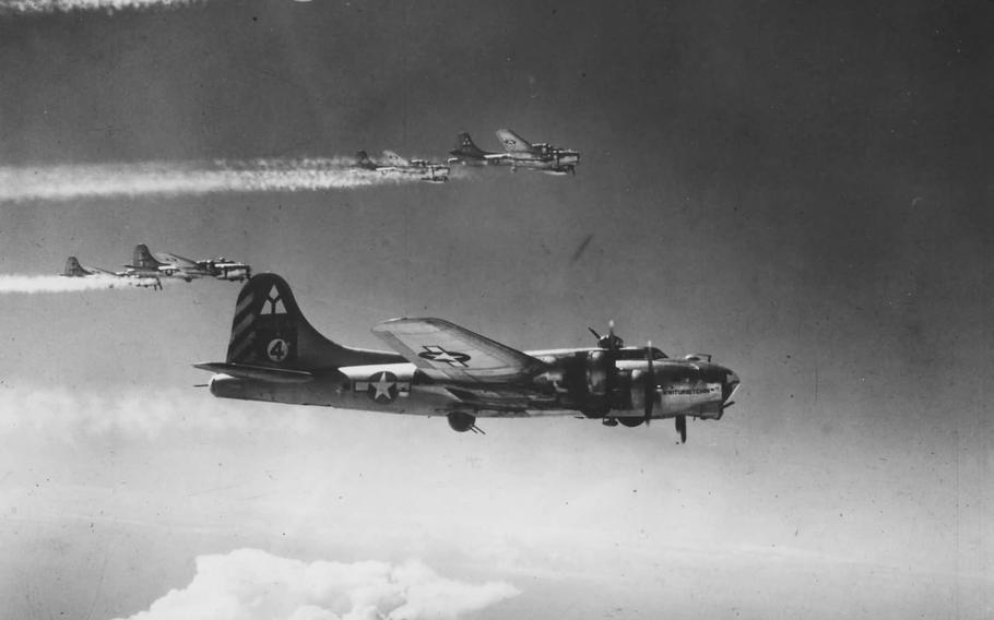 B-17 Flying Fortresses assigned to the 97th Bombardment Group fly into formation during World War II.