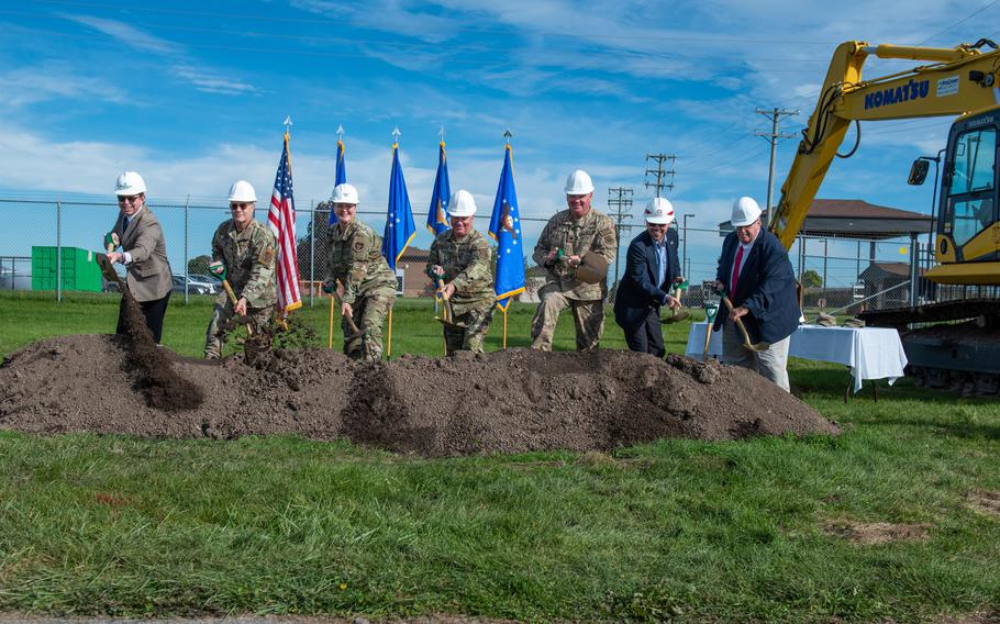 From left, Ian Butt, vice president, Butt Construction Company, Col. Christopher Witter, 914th Mission Support Group commander, Col. Lara Morrison, 914th Air Refueling Wing commander, Command Chief Master Sgt. Scott Peters, 914 ARW, Lt. Col. William Gourlay, 914th Security Forces Squadron commander, Tom Kaiser, U.S. Army Corps of Engineers and John Cooper, Niagara Military Affairs Council president use the traditional golden shovel for the main gate renovation project groundbreaking ceremony at the Niagara Falls Air Reserve Station, N.Y., on Oct. 4, 2022.