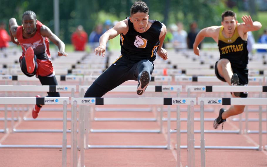 Vicenza’s Zach Denton won the boys 110-meter hurdle race in 15.39 seconds, at the DODEA-Europe track and field championships in Kaiserslautern, Germany. Second was Stuttgart’s Tyler Farrar, right, Kaiserslautern’s Jerrell Thomas, left, was third. 