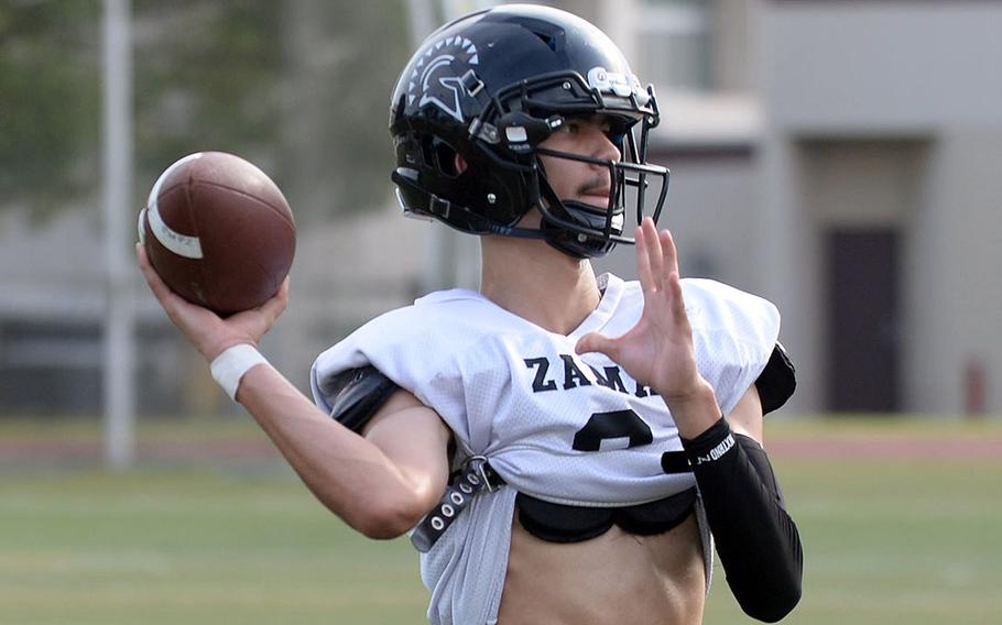 Starting quarterback Adrian Santiago-Cruz is a senior, but he's new to Zama football.
