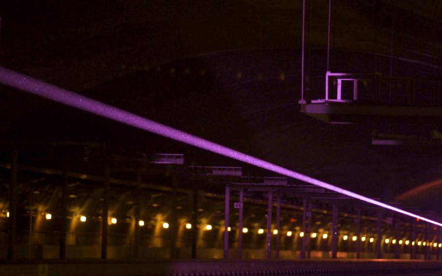 Navy researchers for the first time demonstrate laser power beaming technology at the Naval Surface Warfare Center in Bethesda, Md., on May 23, 2019. After a SpaceX launch this week, the Navy is now ready to spend a year testing the same laser-based technique at the International Space Station to see how wireless power transfers work in space. 