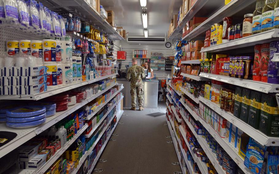 American soldiers can pick up amenities from home at the exchange truck at the Polish base at Bemowo Piskie, where they are deployed with NATO's Battle Group Poland.