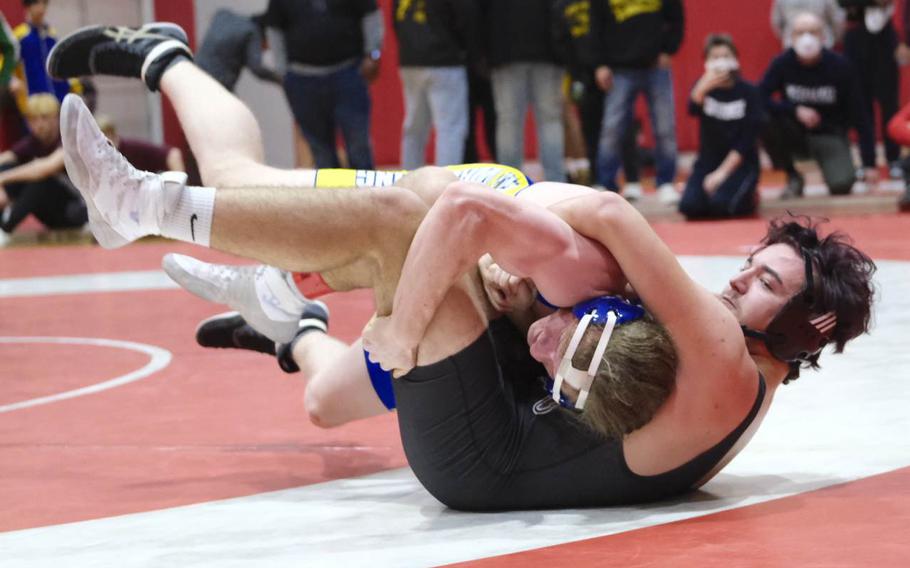 Jaime Marshall of Christian Academy of Japan drives M.C. Perry's Maddix La Rue while winning the Beast of the East 215-pound weight class at Yokosuka Naval Base on Saturday, Jan. 21, 2023. The Australian  steamrolled through the weight class from start to finish.

James Kimber/Special to Stripes