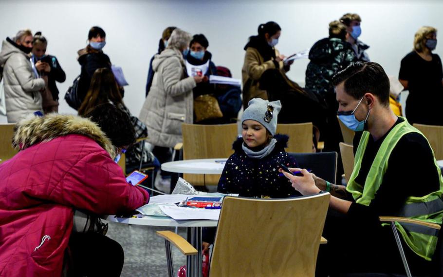 A video screen grab shows Ukrainian refugees in Poland. 