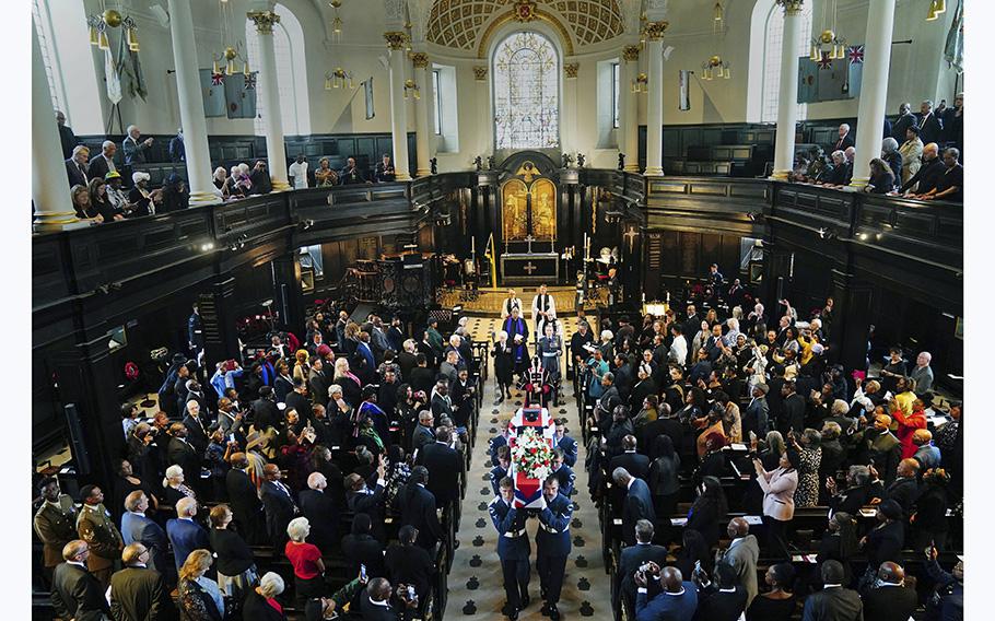 The coffin of former RAF Sergeant Peter Brown is carried out after his funeral service, at St Clement Danes Church, in London, on Thursday May 25, 2023. 