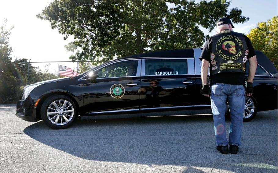 Members of the Patriot Guard Riders and RI state chapter of the Legion Riders were on hand as the hearse carrying the remains of U.S. Army 1st Lt. Anthony R Mazzulla entered the airfield through a service entrance.  The remains of a former altar boy and Providence College student came home to Rhode Island on Tuesday, more than 70 years since he disappeared in one of the most consequential battles of the Korean War.