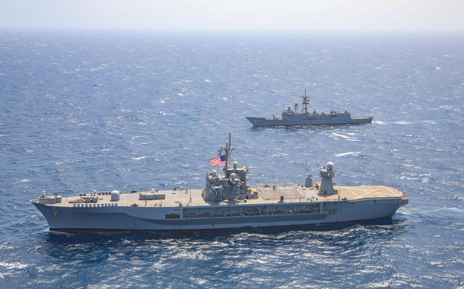 USS Mount Whitney, foreground, and an Egyptian navy frigate operate in the Red Sea in support of Combined Task Force 153 on April 20, 2022. Mount Whitney recently completed a $20.5 million overhaul, but the Navy wants to decommission the ship in 2026.