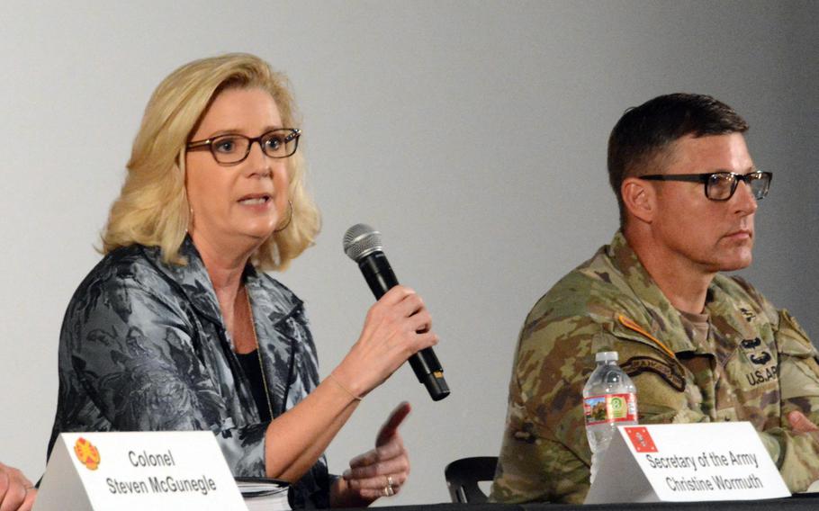 Secretary of the Army Christine Wormuth speaks during a town hall meeting at Schofield Barracks, Hawaii, Tuesday, Jan. 24, 2023, while seated beside Maj. Gen. Joseph Ryan, commander of the 25th Infantry Division.