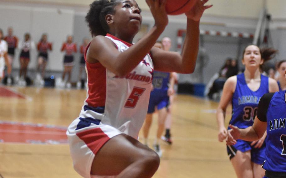 Aviano’s Kayleigh Mitchell goes up for a layup on Friday, Dec. 9, 2022, in the Saints’ 30-16 win over the Rota Admirals in Aviano, Italy.