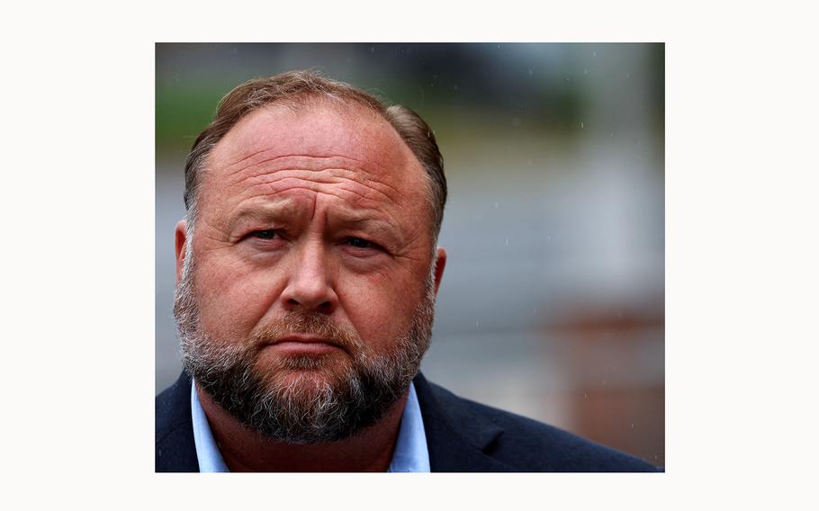 InfoWars founder Alex Jones attends a briefing after appearing at his Sandy Hook defamation trial at Connecticut Superior Court in Waterbury, Conn., on Oct. 4, 2022.