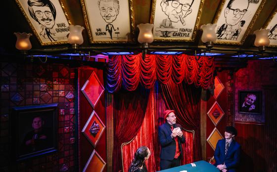 The magician Sharpo performs at the Magic Castle with Trichia Sulham, left, and Matt Sulham, right, on May 30, in Los Angeles.  The club has 38 women in its regular rotation of performers (among 482 magicians over the last three years).  