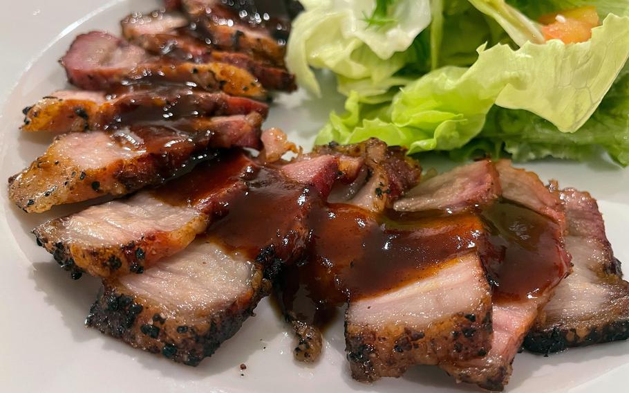 The house-smoked pork belly appetizer from Kemby's Diner in Iwakuni, Japan, was savory and delicious.