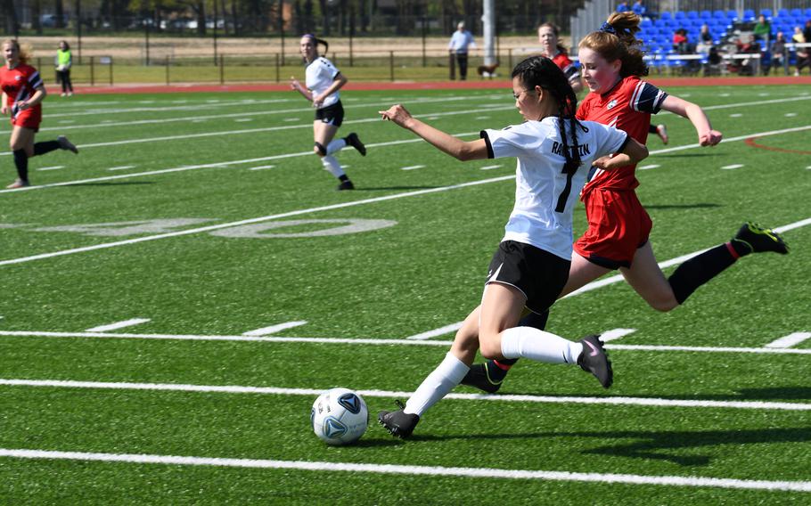 Ramstein's Alayna McConihay attempts a cross against Lakenheath on Saturday, April 16, 2022. This was the first game for both teams in the 2022 season. 