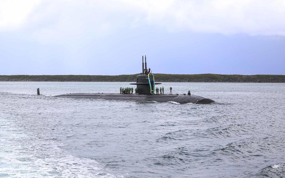 The fast-attack submarine USS Key West returns to Naval Base Guam, Dec. 1, 2021.