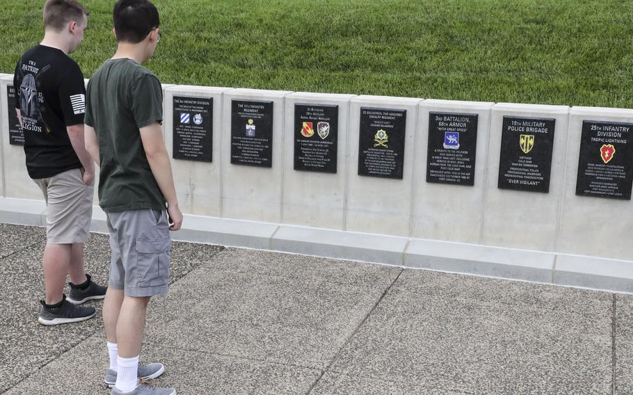 Visitors view unit tributes outside the National Museum of the United States Army on its reopening day, June 14, 2021.