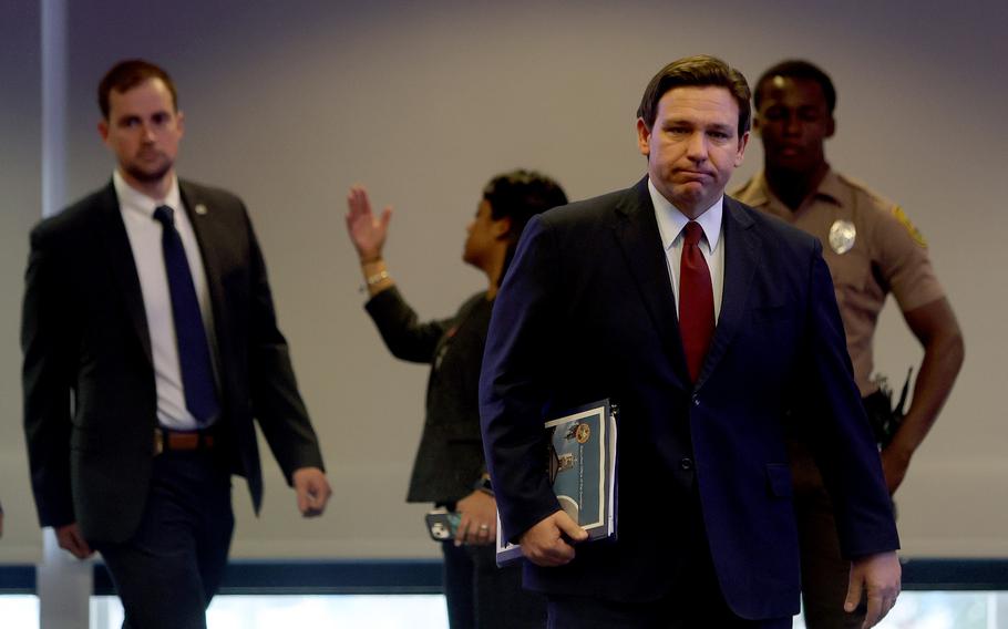 Florida Gov. Ron DeSantis arrives for a news conference at the Miami Dade College’s North Campus on Jan. 26, 2022, in Miami.