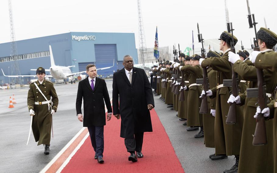 Estonia Defense Minister Hanno Pevkur and U.S. Defense Secretary Lloyd Austin review troops following Austin’s arrival in Tallinn, Estonia, for security talks on Thursday, Feb. 16, 2023.