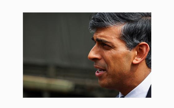 Britain's Prime Minister Rishi Sunak speaks as he takes part in broadcasting a clip during his visit to the Helles Barracks at the Catterick Garrison, a military base in North Yorkshire, on May 3, 2024. Britain's Labour opposition urged Prime Minister Rishi Sunak to call a general election, on May 3, after seizing another parliamentary seat from the Conservatives and making significant gains in English local elections. (Molly Darlington/Pool/AFP via Getty Images/TNS)