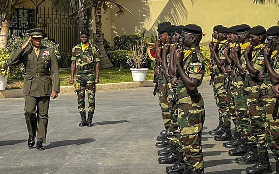 Gen. Michael Langley, commander of U.S. Africa Command, salutes Senegalese troops during his visit to the African country, Feb. 6, 2023. Langley told reporters on March 2 that the Russia-backed Wagner Group is destabilizing other nations in Africa.