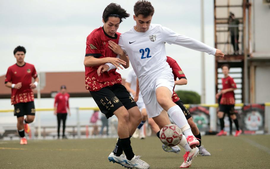 Kaito Durrance and William Arjmandpour square off for the ball.