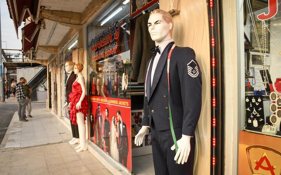 A mannequin wearing a U.S. Air Force uniform stands outside a tailor’s shop in the American Alley outside the gate of Incirlik Air Base in southern Turkey, on Feb. 27, 2023.