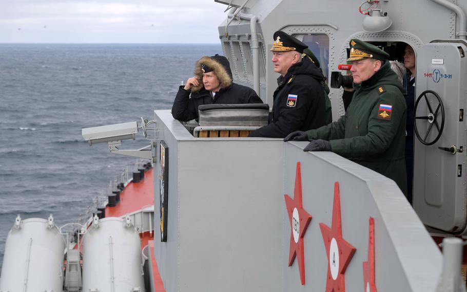 Russian President Vladimir Putin, left, Commander-in-Chief of the Russian Navy Nikolai Yevmenov, second right, and Commander of the Southern Military District troops Alexander Dvornikov, right, watch a navy exercise from the Marshal Ustinov missile cruiser in the Black Sea, Crimea, Jan. 9, 2020. Dvornikov, known as “the butcher of Syria” for his brutality while commanding Russian forces there in 2015, has been appointed as the top commander of Russian forces in Ukraine, a senior U.S. defense official confirmed Monday, April 11, 2022.