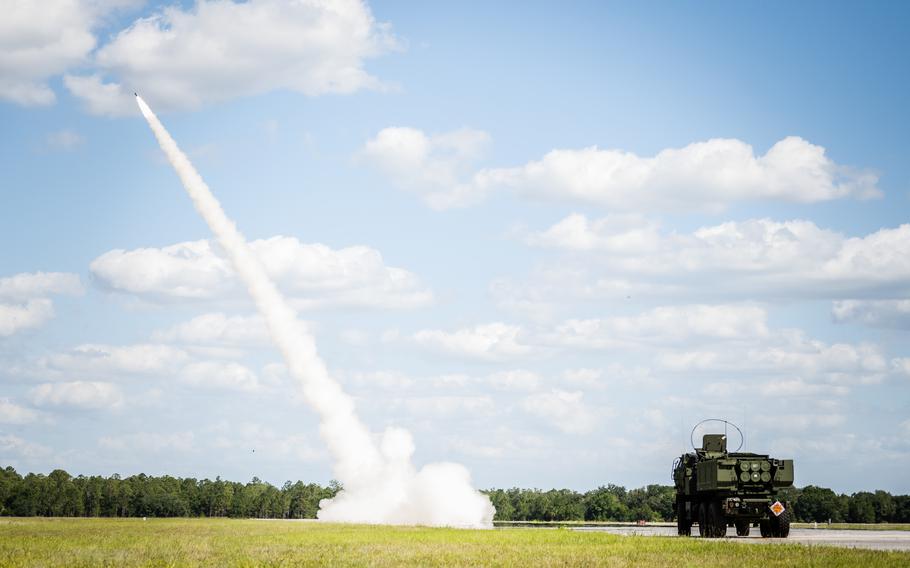 Marines conduct live-fire training with a High Mobility Artillery Rocket System, or HIMARS, at Avon Park, Fla., on May 10, 2022. The high-tech, medium-range rockets are part of a new $700 million military aid package for Ukraine.