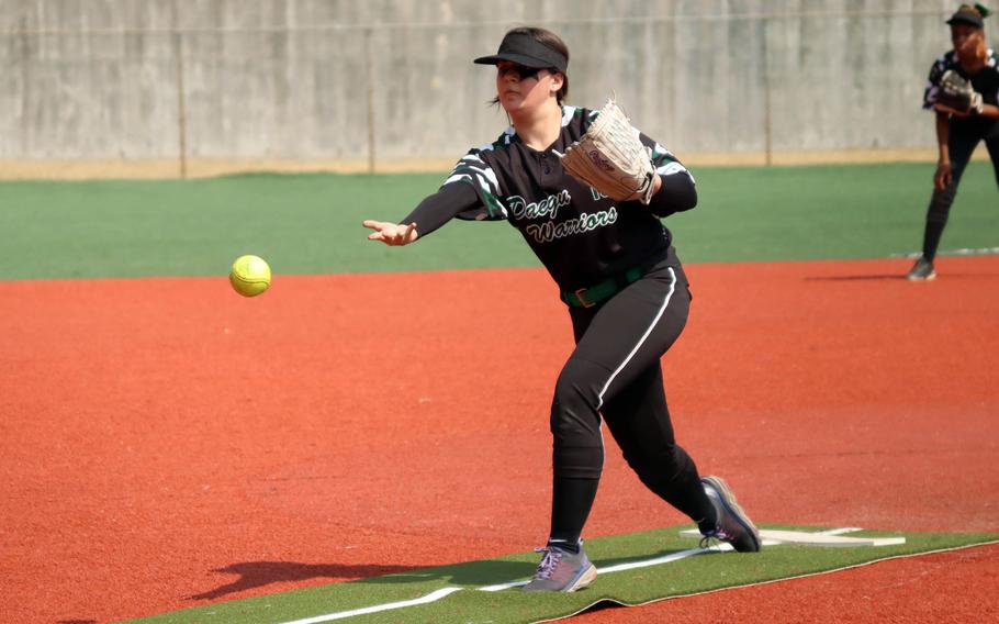 Leanne Douke pitches.