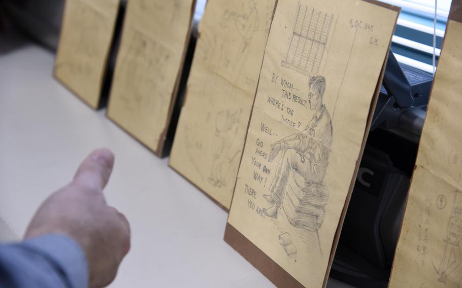 A series of sketches that Shichiro Matake made in Sugamo Prison are returned to his children at Kurume University in Fukuoka, Japan, Nov. 24, 2023. Matake was a doctor convicted, and later acquited, of war crimes against U.S. soldiers during World War II.
