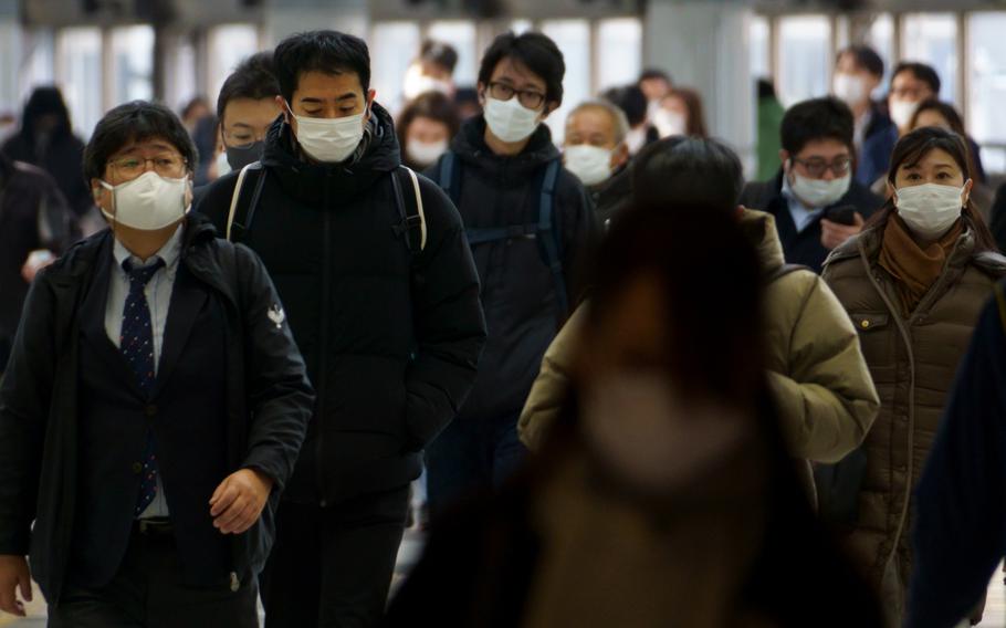 Tokyo reported a one-day record of 12,813 new coronavirus infections on Tuesday, Jan. 25, 2022. 