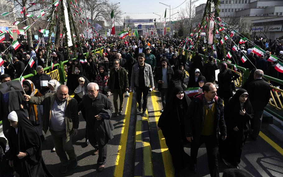 Iranians attend the annual rally commemorating the 1979 Islamic Revolution at the Azadi (Freedom) Street in Tehran, Iran, Sunday, Feb. 11, 2024. Iran marked the 45th anniversary of the 1979 Islamic Revolution amid tensions gripping the wider Middle East over Israel’s continued war on Hamas in the Gaza Strip.