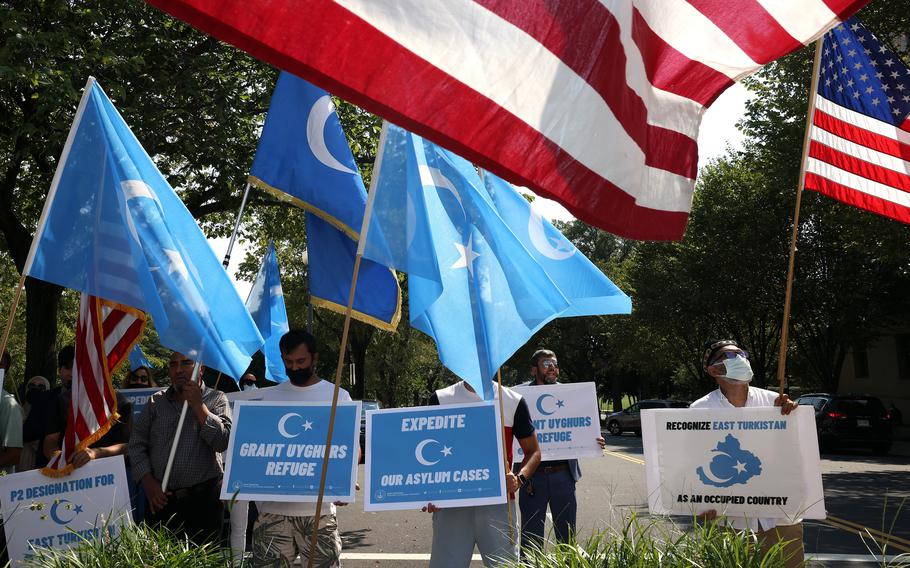 Members of the Uyghurs community, a mainly Muslim ethnic group originating from central and east Asia, rally against the Chinese government at the U.S. State Department on Sept. 15, 2021, in Washington, D.C.