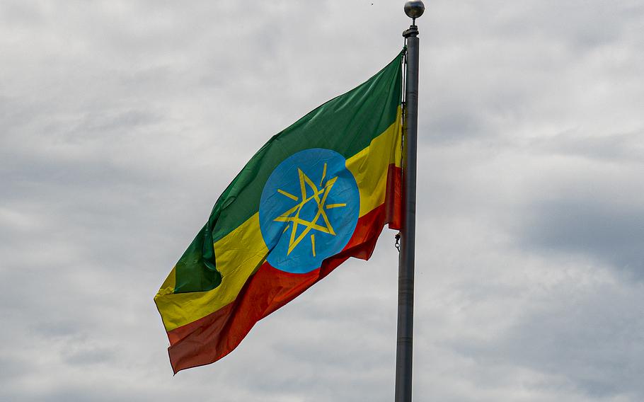 The Ethiopian flag flies above Ethiopia’s embassy in Washington, D.C., on July 6, 2022. An uneasy peace in Ethiopia’s civil war had meant that, at least since March, the flow of wounded had paused. Then an airstrike in late August hit a nursery school. 