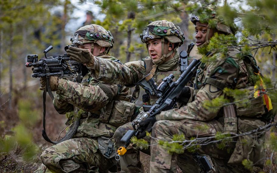 Soldiers assigned to the 1st Cavalry Division scan for counterparts acting as opposing forces during exercise Arrow 23 in Niinisalo, Finland, May 4, 2023. The U.S. and Finland are finalizing a deal that would let U.S. troops use a range of bases in Finland.