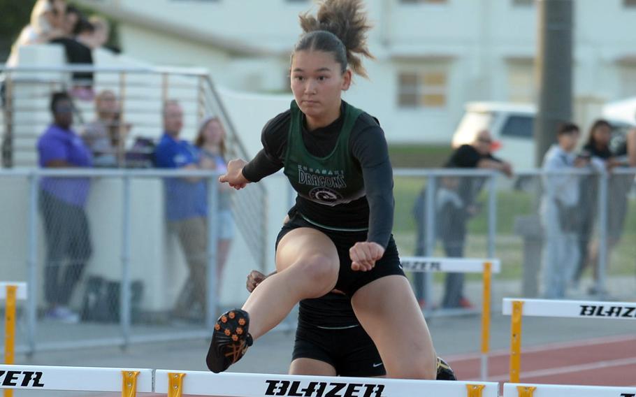 Yuri Biggins clears a hurdle.