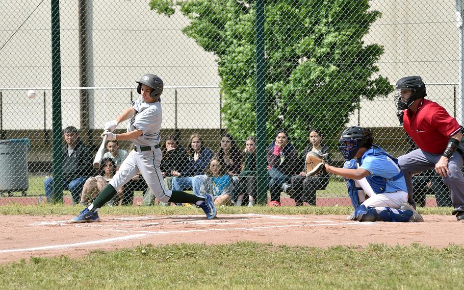 Naples’ David Manus swings during the Division II/III European baseball championship game against Sigonella on May 20, 2023, at Southside Fitness Center on Ramstein Air Base, Germany.