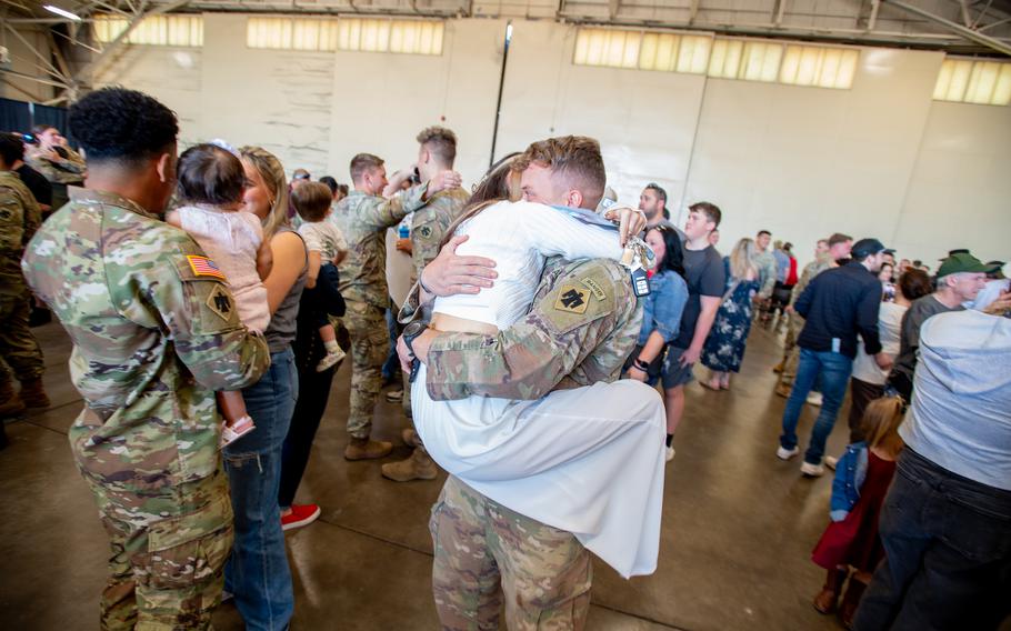 A member of Task Force Tomahawk reunites with their family during a welcome home ceremony at Will Rogers Air National Guard Base in Oklahoma City, Friday, Feb. 23, 2024. 