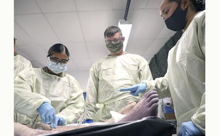U.S. soldiers conduct Perfused Cadaver Training at the Medical Simulation Training Center on Schofield Barracks, Hawaii, April 14, 2021. The training allows soldiers to train on human tissue to better equip them for the battlefield.
