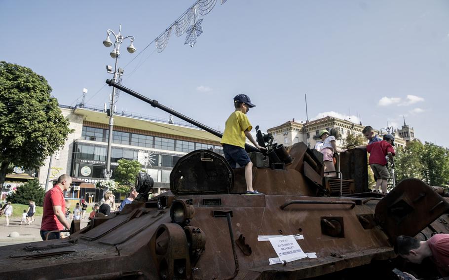 Members of the public visit an exhibit of destroyed Russian military equipment on Khreschatyk Street, ahead of Independence day, in Kyiv, Ukraine, on Aug. 21, 2022. 