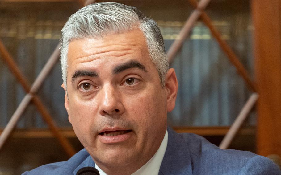 Ciscomani is seated and speaks during a hearing.