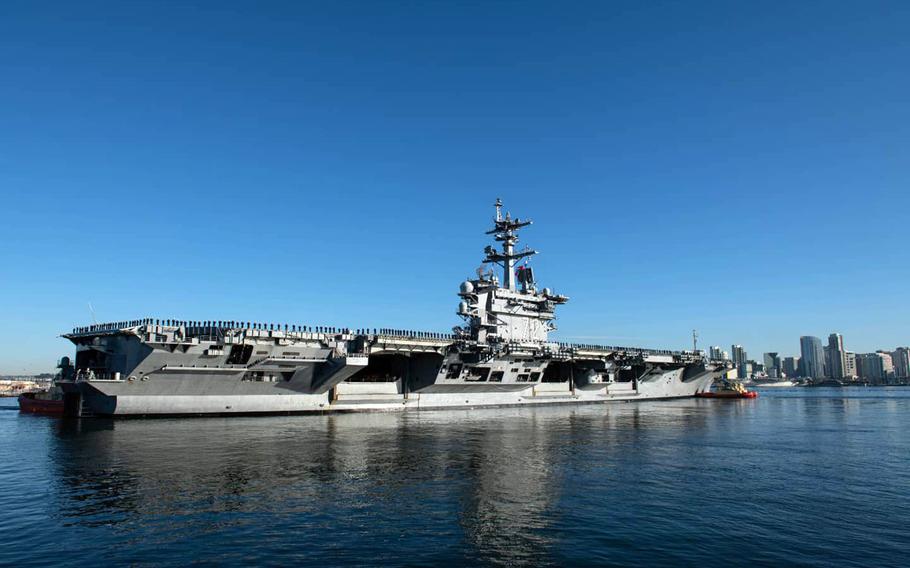 The aircraft carrier USS Abraham Lincoln departs for a deployment from San Diego, Calif., Jan. 3, 2022. 