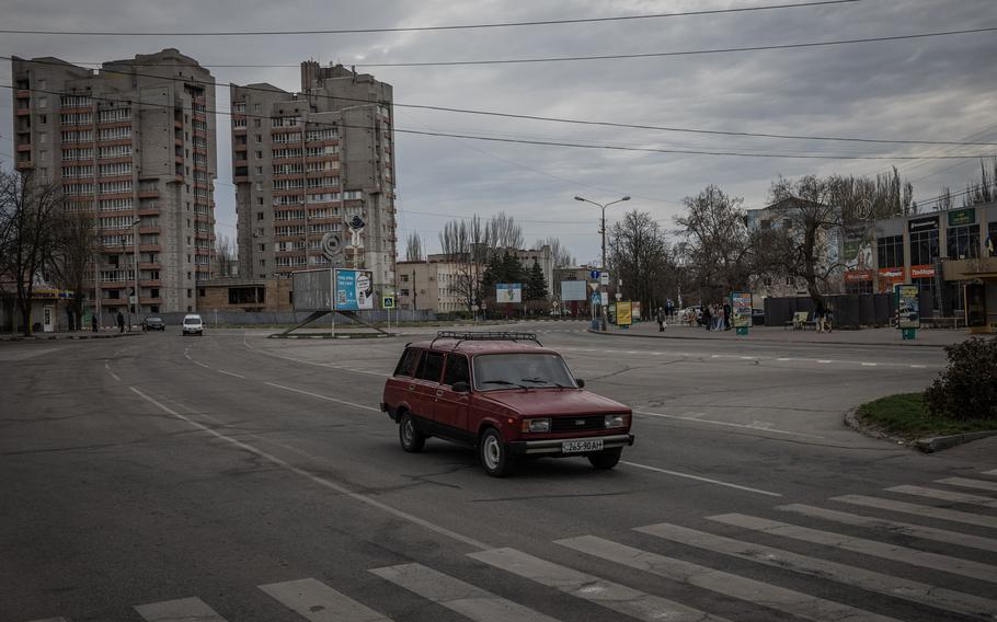 A car drives down the road in Nikopol.
